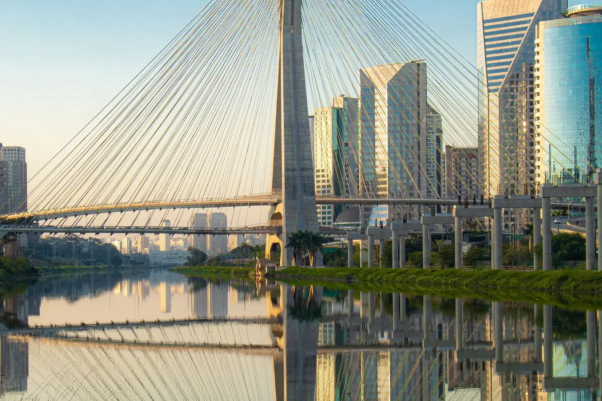 Octávio Frias de Oliveira Bridge (Ponte Estaiada) in São Paulo, reflected in the Pinheiros River at dawn