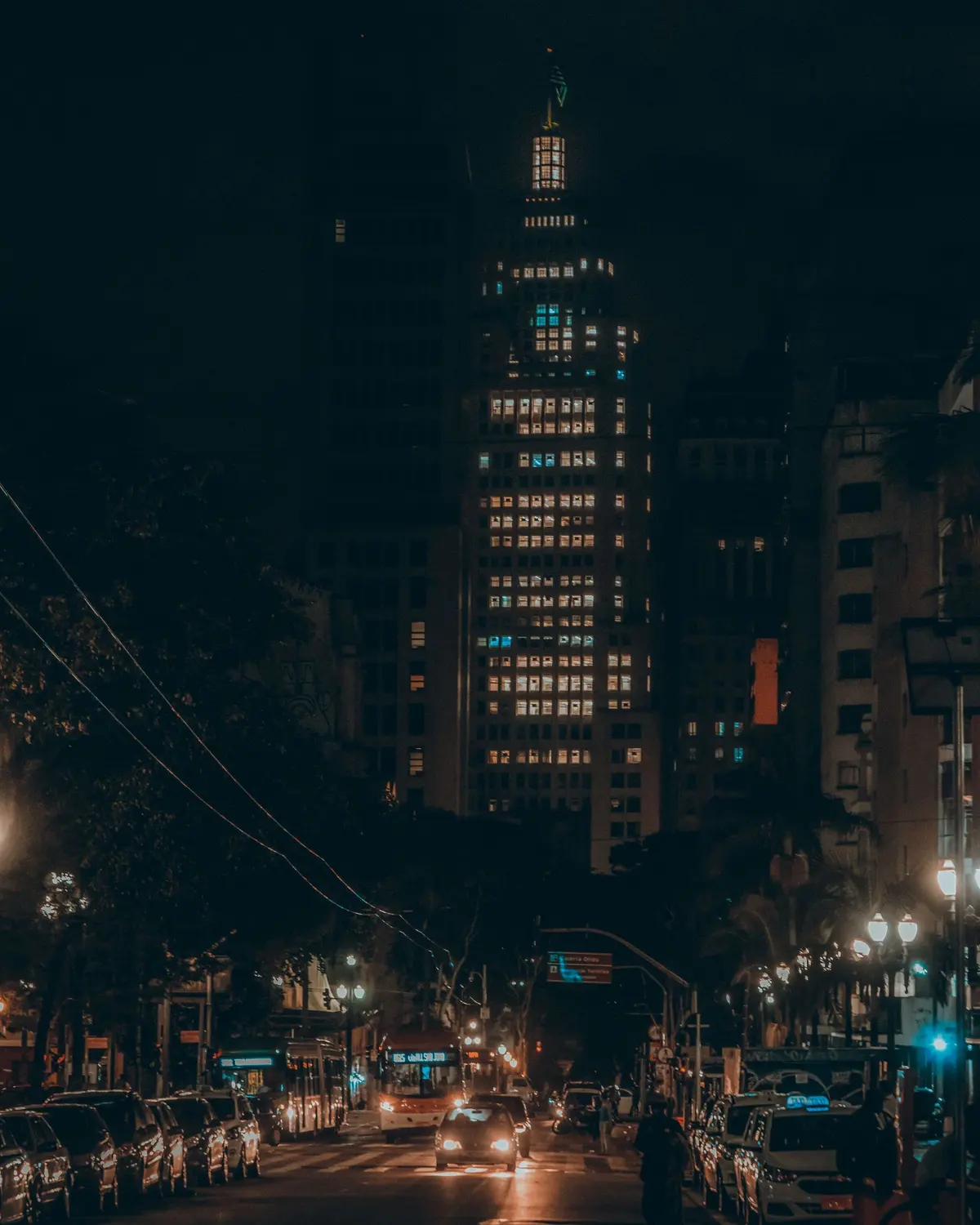 Farol Santander building lit up at night in downtown São Paulo